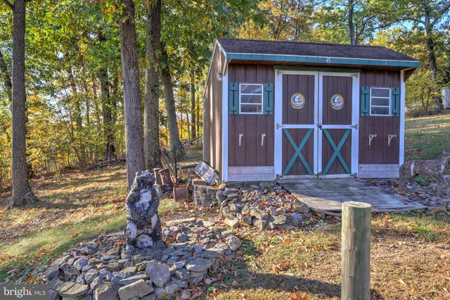 a sign that is on a brick wall