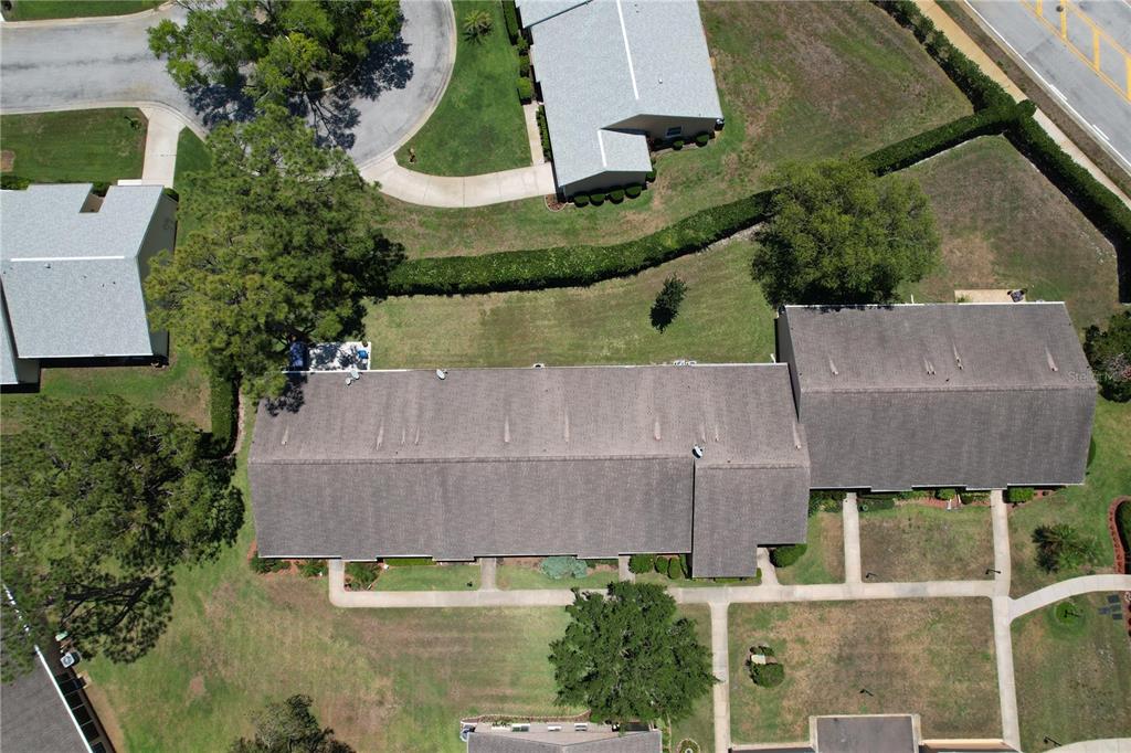 9319 Trowbridge Court New Port Richey, FL 34655 - Photo 70 of 78 an aerial view of a house with swimming pool and outdoor space