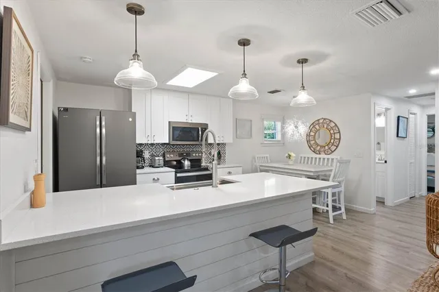 $1,500,000 | 201 72nd Street, Unit A & B, Holmes Beach, FL 34217