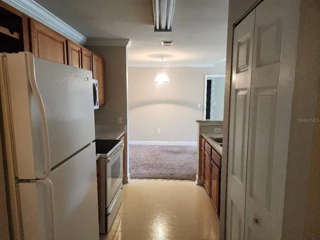 a view of a kitchen from a windows