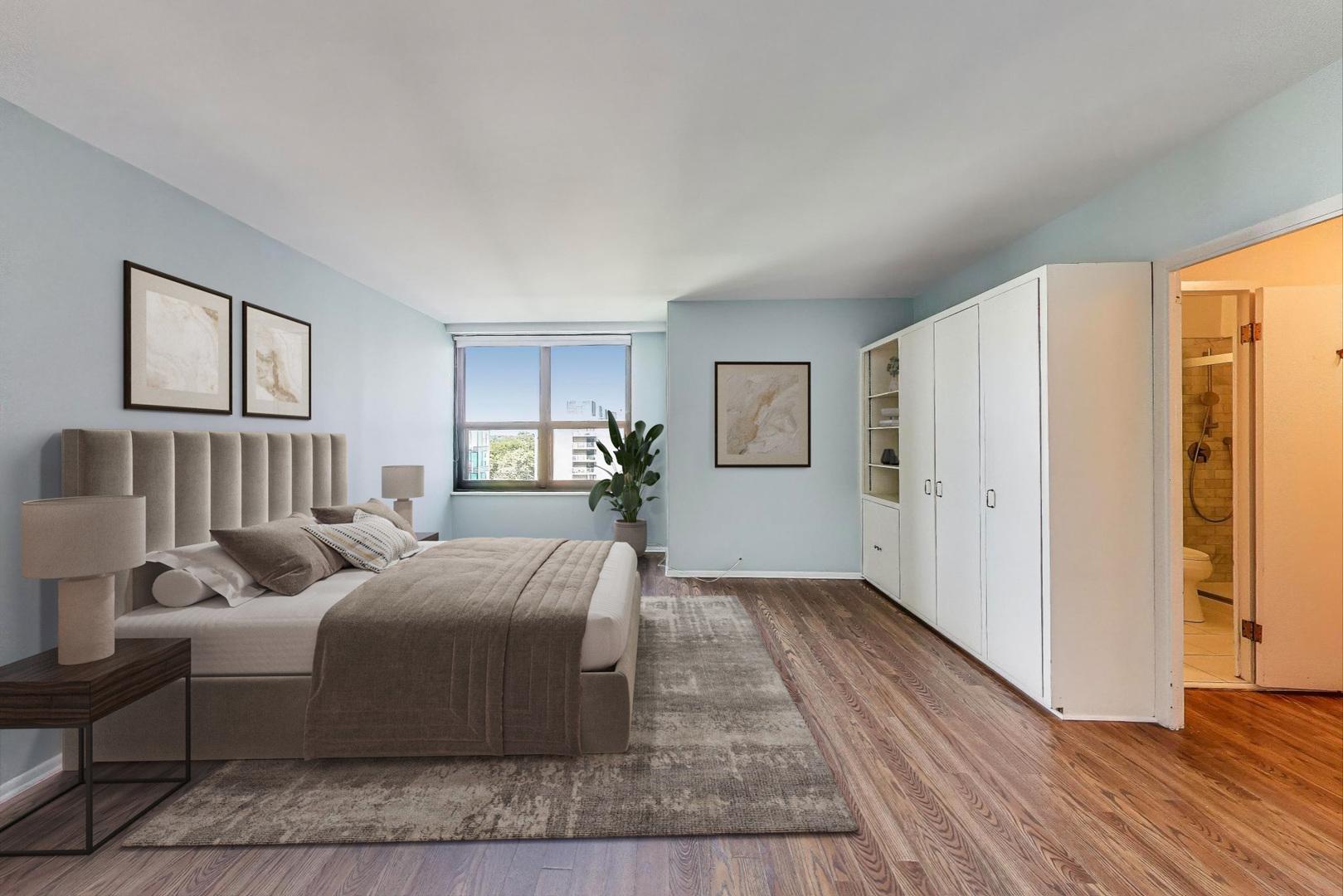 1616 Sheridan Road, Unit 9H Wilmette, IL 60091 - Photo 14 of 28 a bedroom with a large bed a chandelier and closet