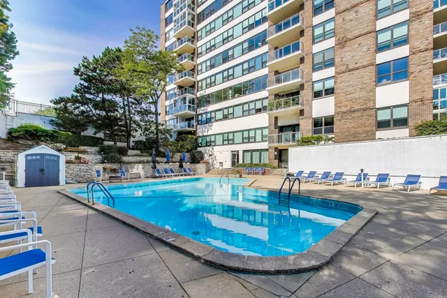 a view of house with outdoor space and seating area