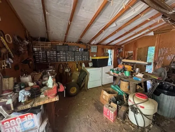 a view of swimming pool with a yard