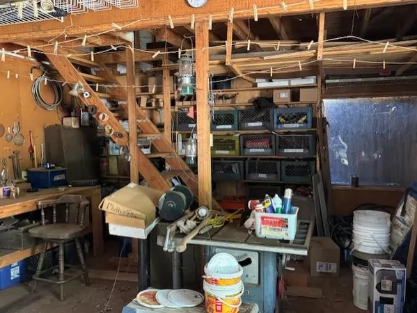 a view of a house with a tree