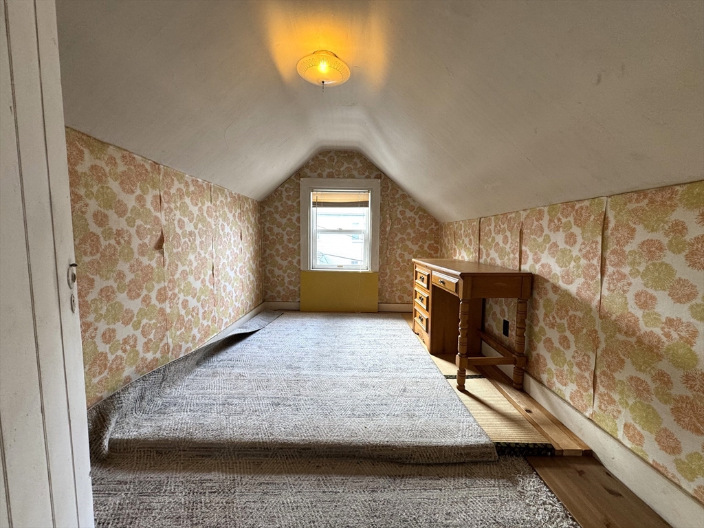 30 Thorpe Street, Unit 2 Somerville, MA 02143 - Photo 6 of 9 a living room with furniture rug and window