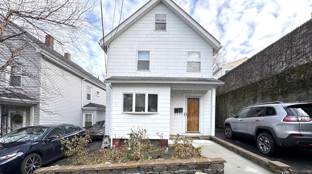 30 Thorpe Street, Unit 2 Somerville, MA 02143 - Photo 8 of 9 a view of a car parked front of a house