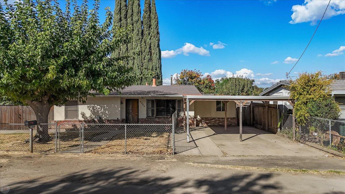 2335 Robertson Road Modesto, CA 95358 - Photo 1 of 1 a garden view with a seating space