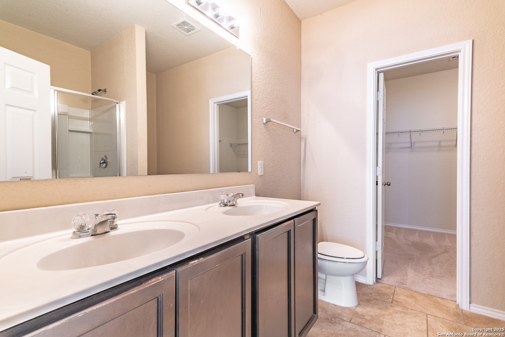 7710 Paraiso Haven Boerne, TX 78015 - Photo 15 of 29 a bathroom with a sink toilet and shower