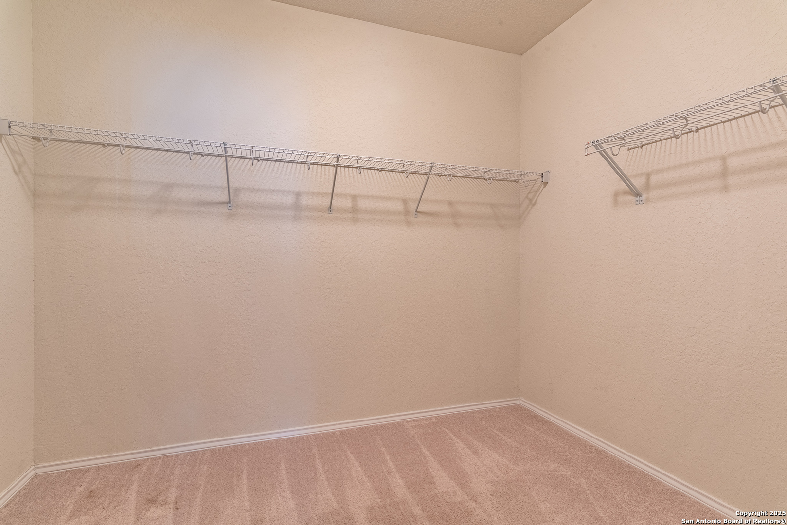 7710 Paraiso Haven Boerne, TX 78015 - Photo 16 of 29 a view of a room with racks on the wall