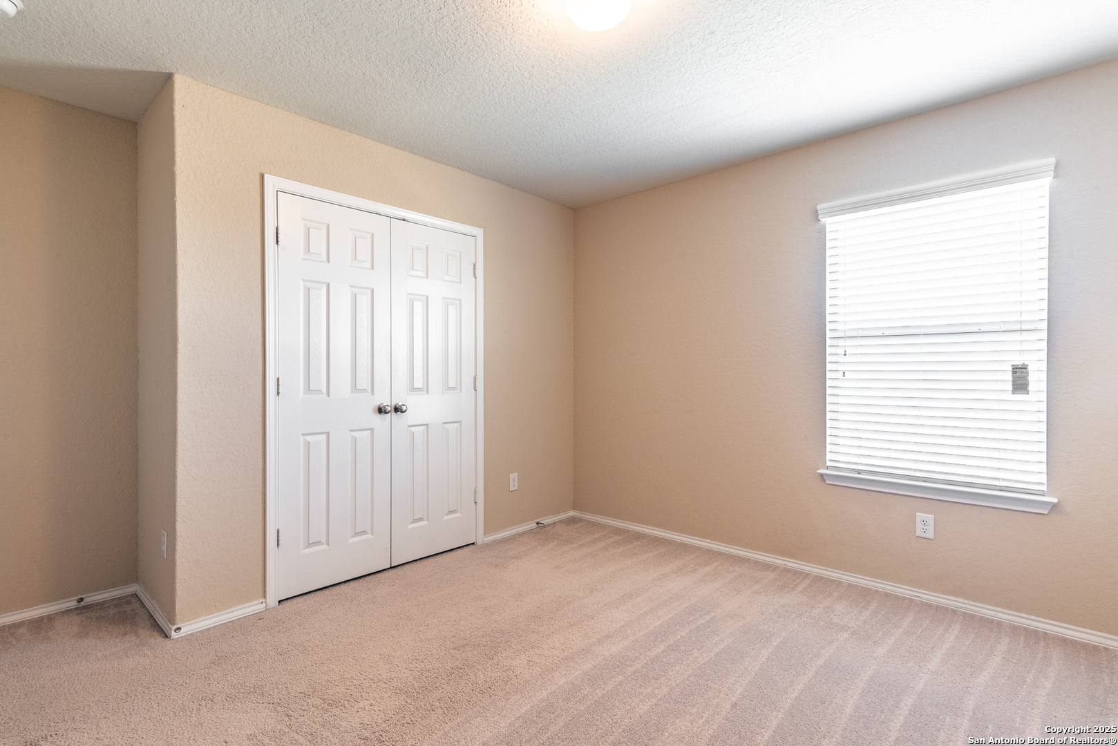 7710 Paraiso Haven Boerne, TX 78015 - Photo 22 of 29 a view of an empty room with a window