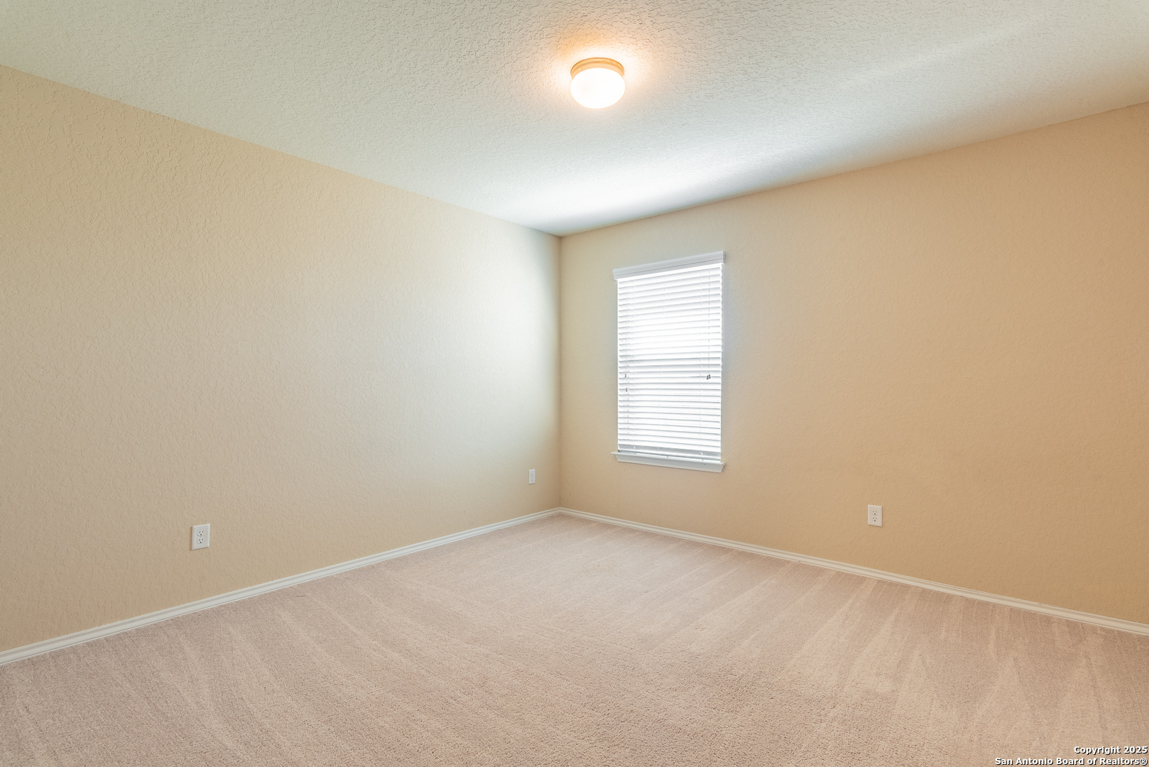 7710 Paraiso Haven Boerne, TX 78015 - Photo 23 of 29 an empty room with a window