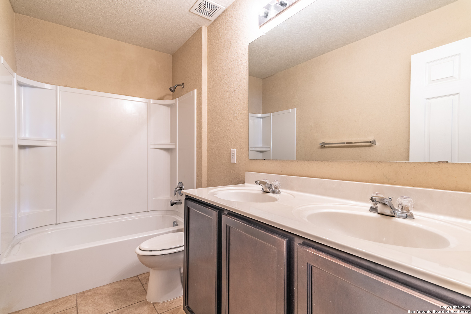 7710 Paraiso Haven Boerne, TX 78015 - Photo 24 of 29 a bathroom with a sink and a mirror