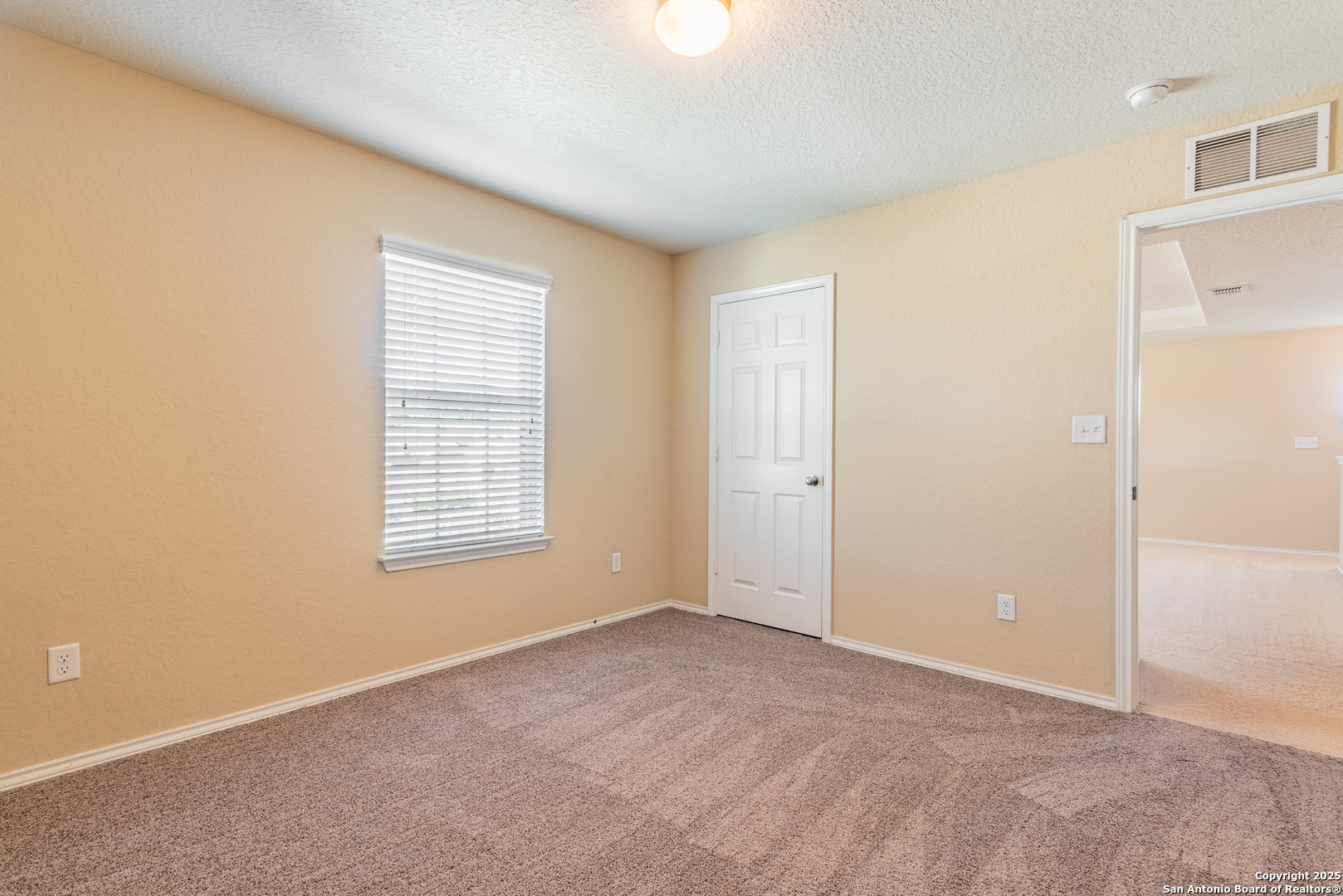 7710 Paraiso Haven Boerne, TX 78015 - Photo 25 of 29 a view of an empty room with a window