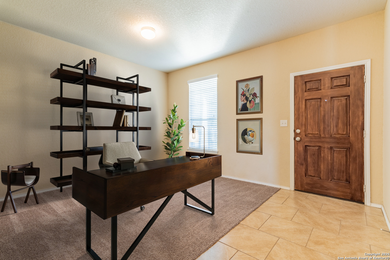 7710 Paraiso Haven Boerne, TX 78015 - Photo 3 of 29 a view of a workspace with furniture and a window