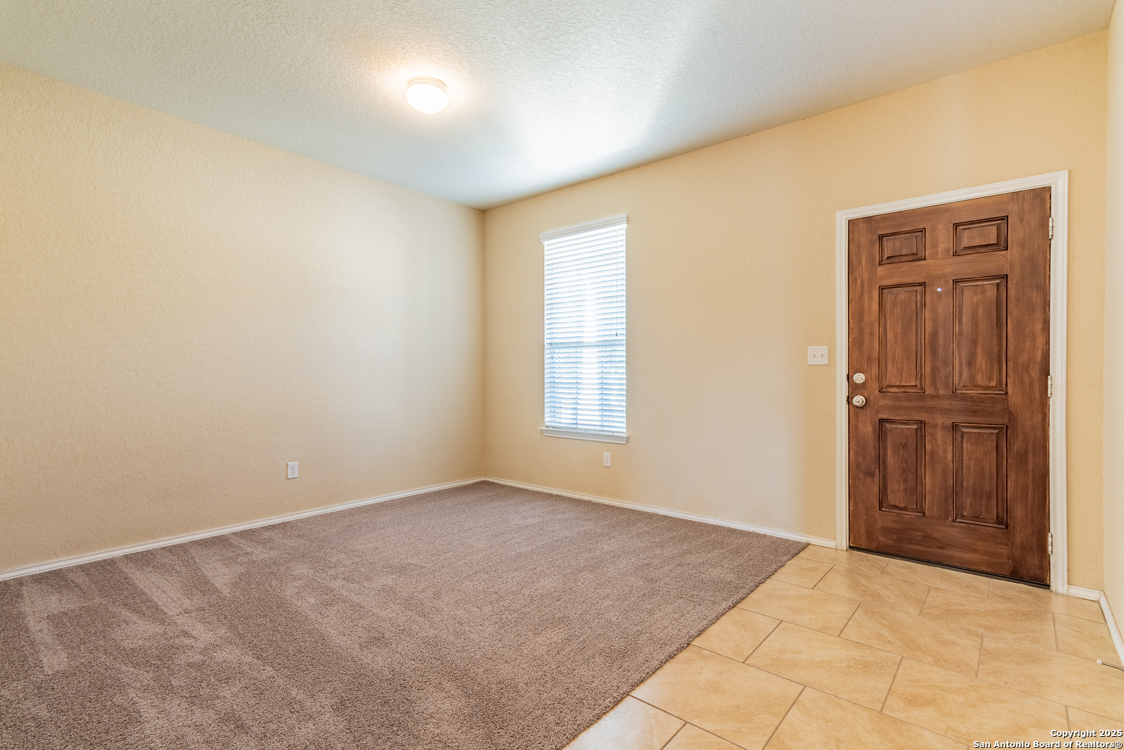 7710 Paraiso Haven Boerne, TX 78015 - Photo 4 of 29 a view of an empty room and window