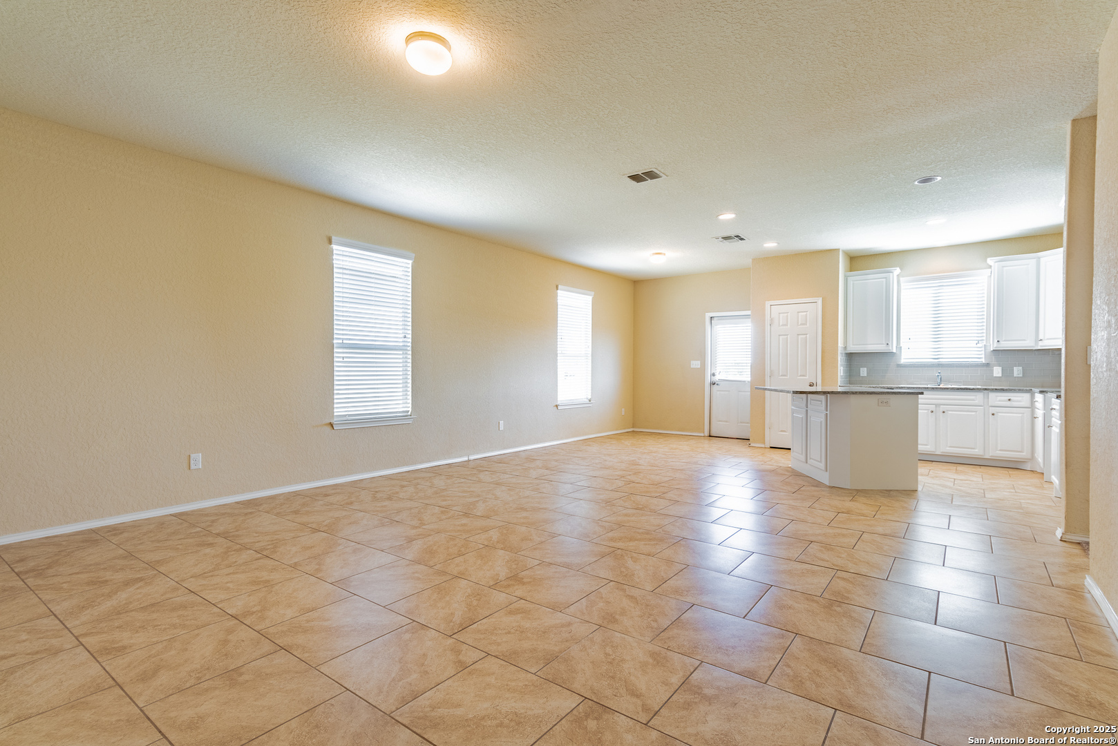 7710 Paraiso Haven Boerne, TX 78015 - Photo 6 of 29 a view of a kitchen with a sink and a window