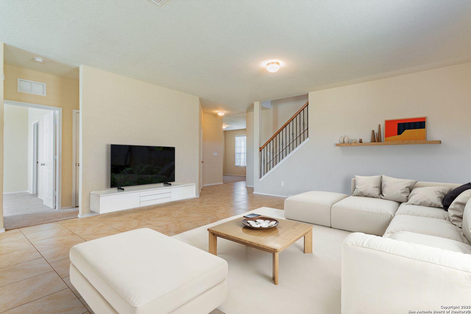 7710 Paraiso Haven Boerne, TX 78015 - Photo 7 of 29 a living room with furniture and a flat screen tv