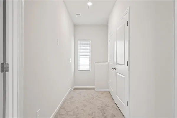 a view of hallway with window