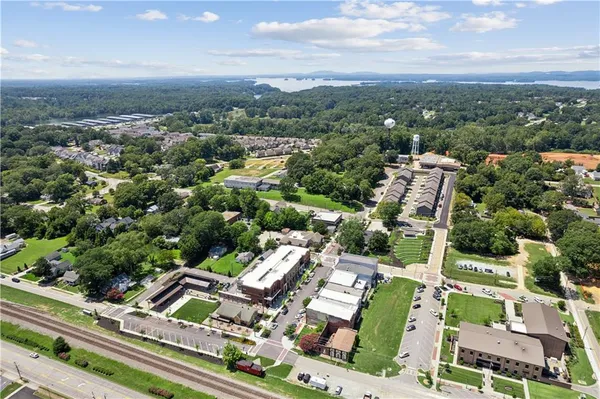 an aerial view of residential houses with outdoor space