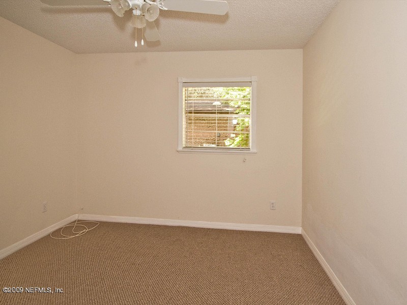 221 Swallow Road St. Augustine, FL 32086 - Photo 8 of 17 an empty room with a window