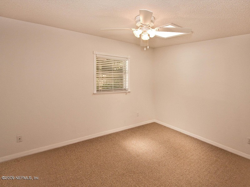 221 Swallow Road St. Augustine, FL 32086 - Photo 10 of 17 an empty room with a window