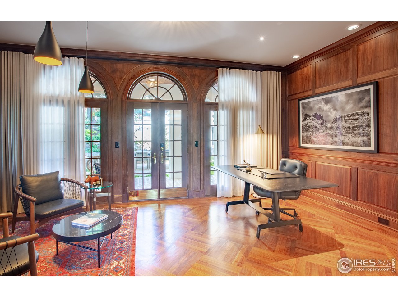 985 Gilbert Street Boulder, CO 80302 - Photo 12 of 40 a living room with furniture and a large window