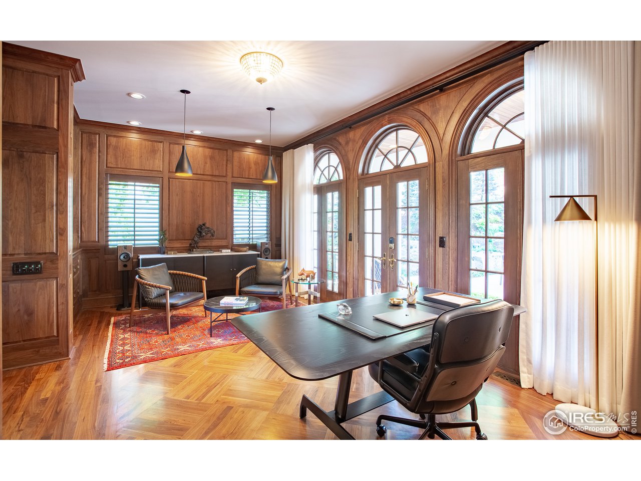 985 Gilbert Street Boulder, CO 80302 - Photo 13 of 40 a view of a dining room with furniture and a large window