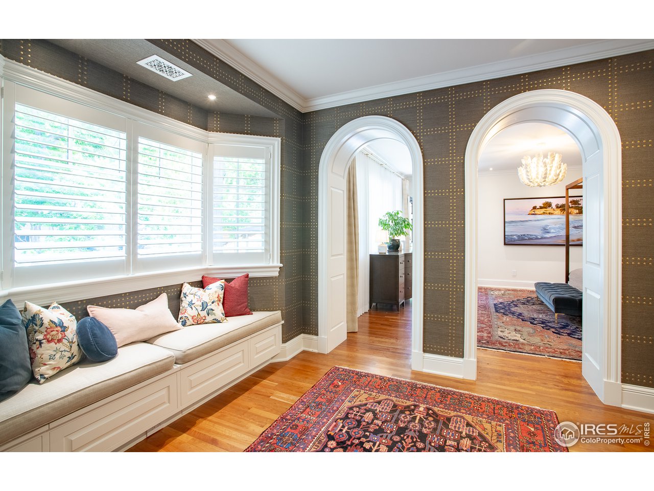 985 Gilbert Street Boulder, CO 80302 - Photo 22 of 40 a living room with furniture and a floor to ceiling window