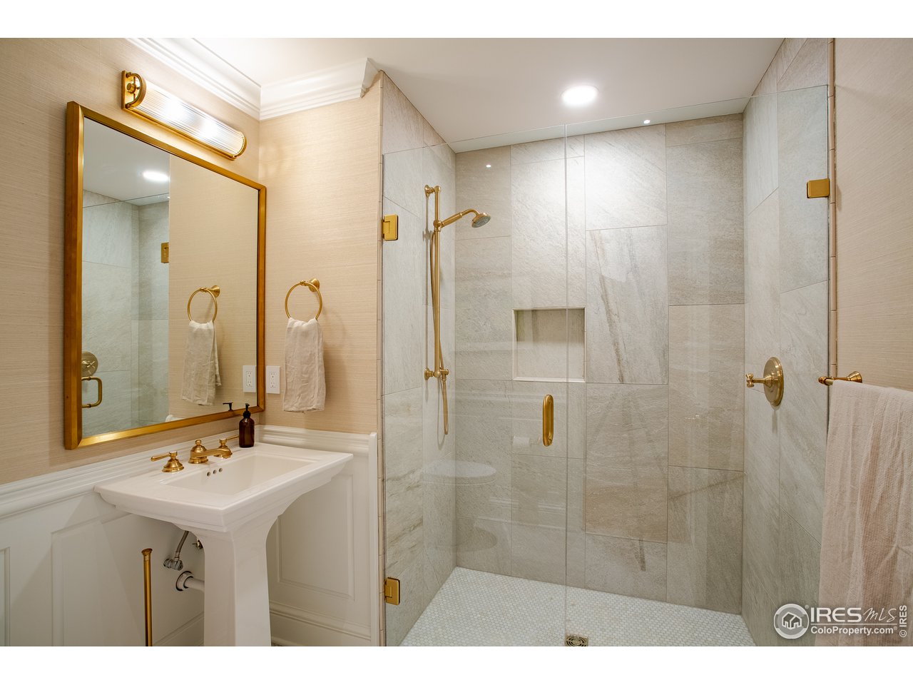 985 Gilbert Street Boulder, CO 80302 - Photo 29 of 40 a bathroom with a sink shower and a mirror