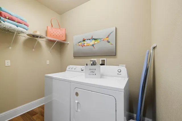a utility room with dryer and washer