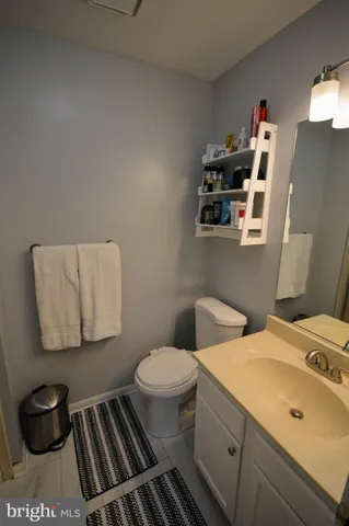 a bathroom with a toilet and a sink