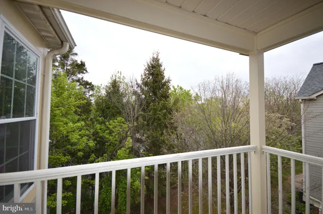 a view of a balcony with outdoor space