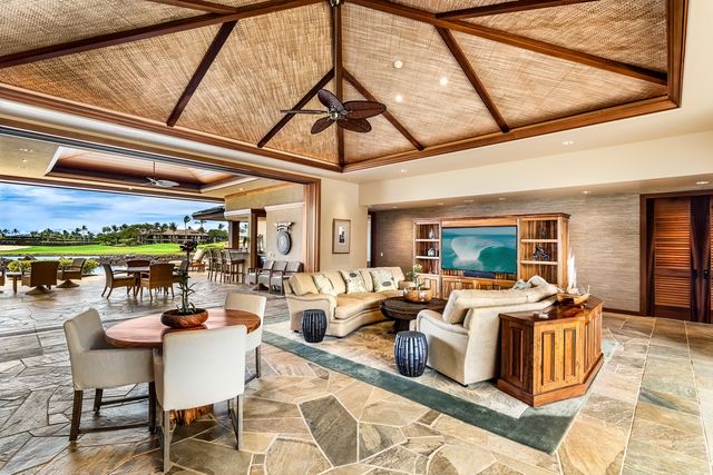 a very nice looking living room with a large window