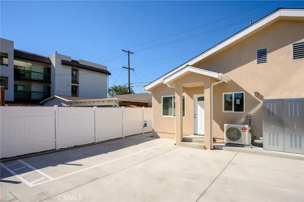 a front view of a house with a garage