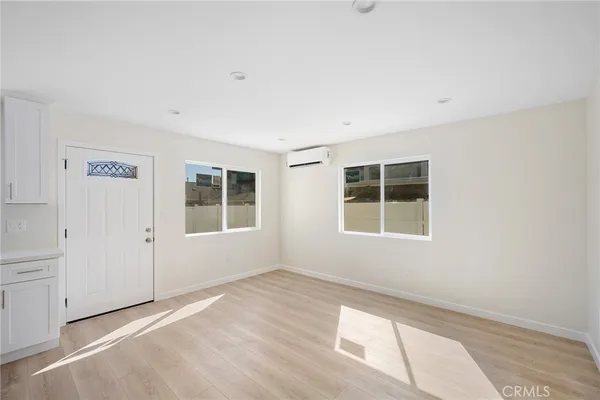an empty room with windows