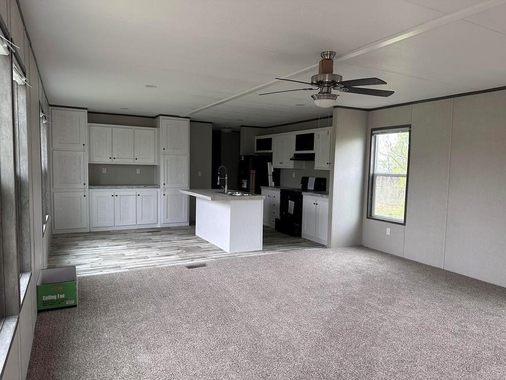 1848 South 4th Merkel, TX 79536 - Photo 8 of 8 a view of a kitchen with a sink cabinets and window
