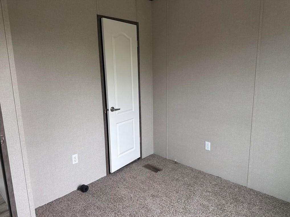 1848 South 4th Merkel, TX 79536 - Photo 5 of 8 an empty room with an entrance to other room