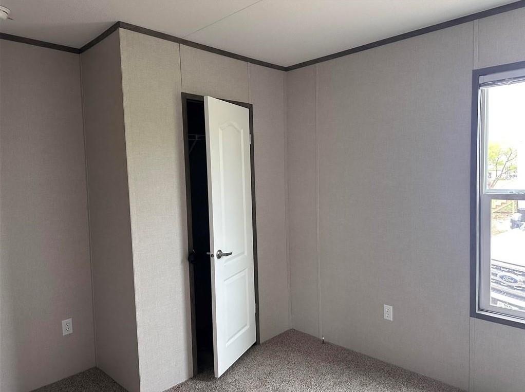 1848 South 4th Merkel, TX 79536 - Photo 6 of 8 a view of an empty room with a window