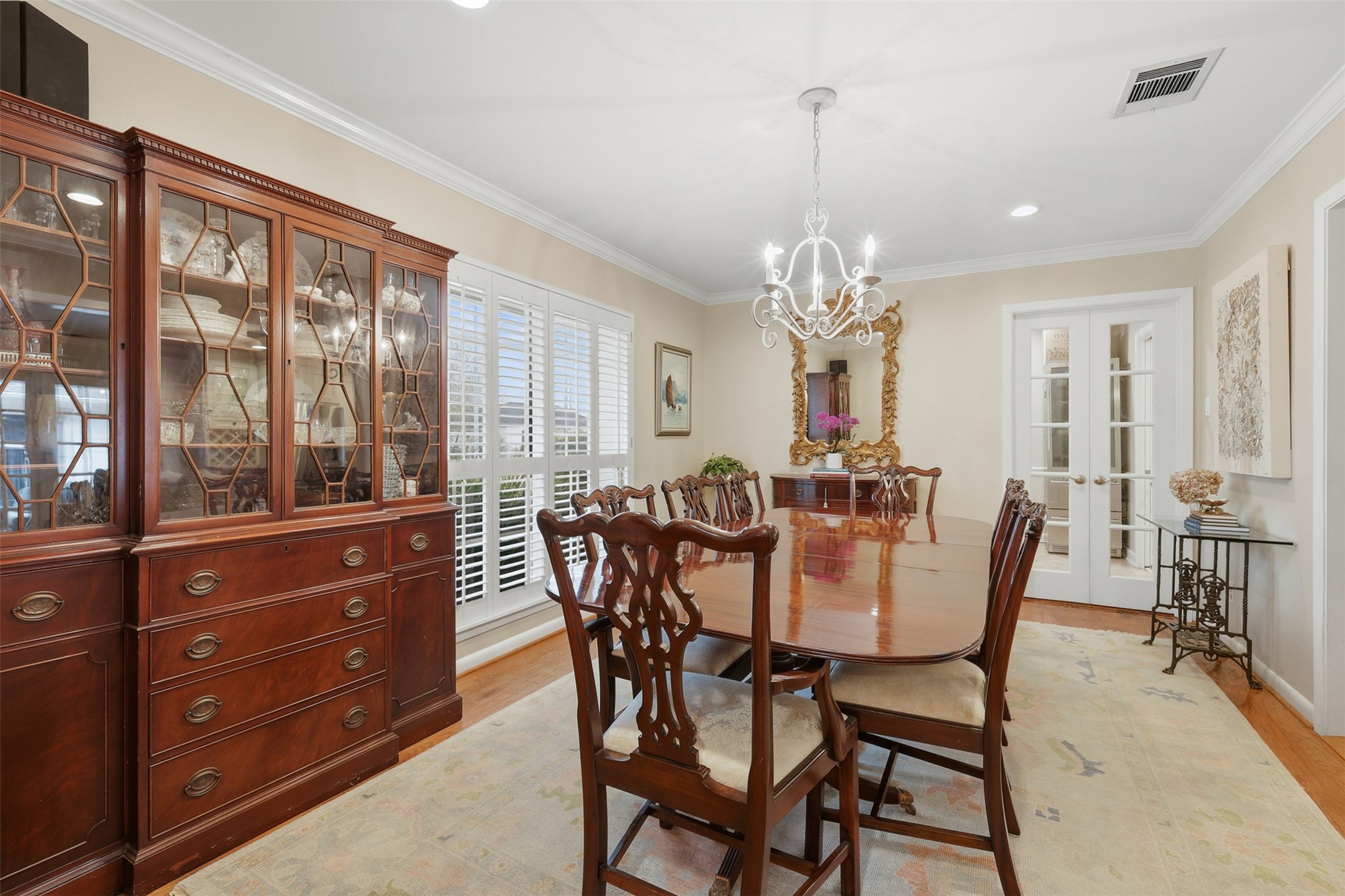 6236 Locke Lane Houston, TX 77057 - Photo 4 of 35 The dining room features plenty of natural light with south-facing windows. The doors in the back right of the dining room lead to a flex space the sellers are currently utilizing as a playroom.