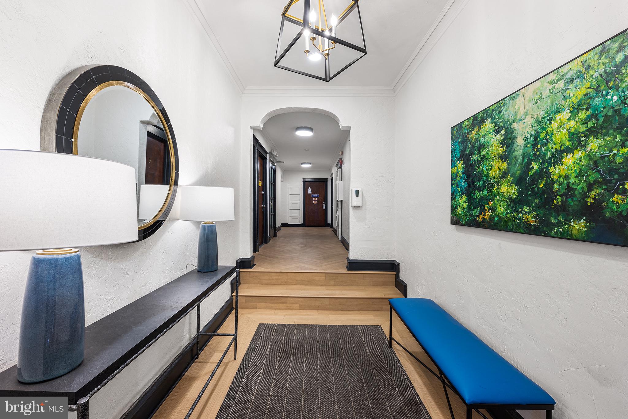 100 Morton Avenue, Unit D304 Ridley Park, PA 19078 - Photo 2 of 9 a view of entryway and hall with wooden floor