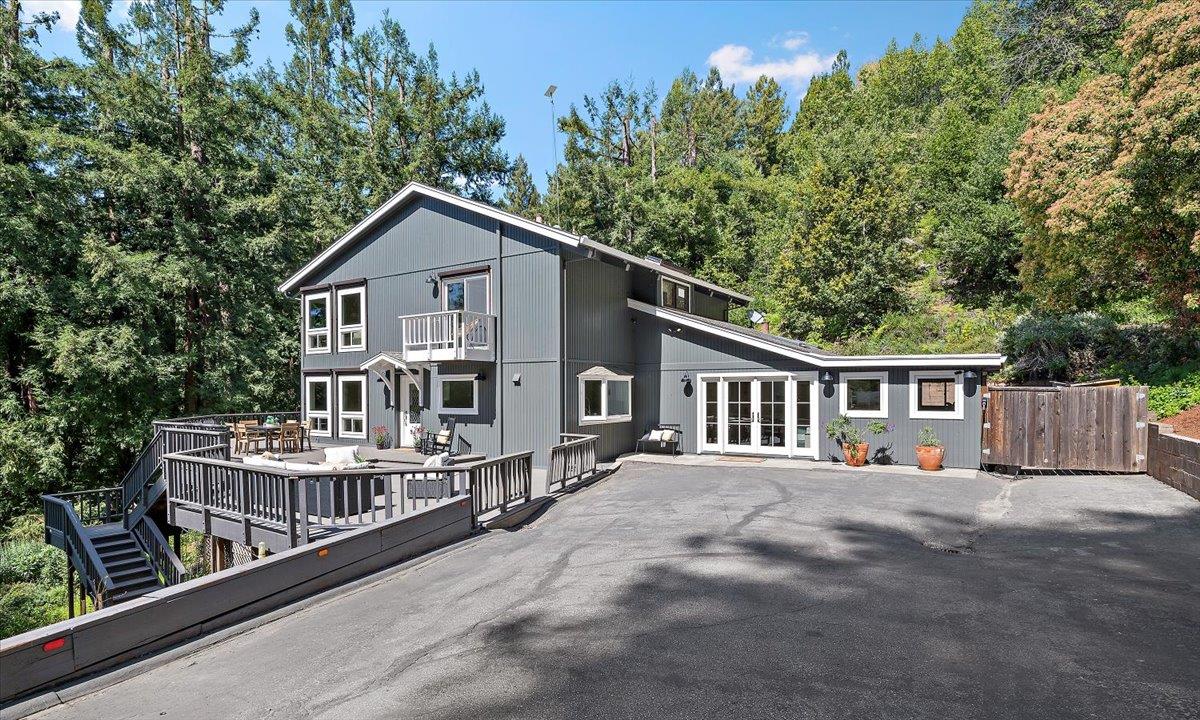 15251 Old Ranch Road Los Gatos, CA 95033 - Photo 1 of 38 a view of a house with a roof deck