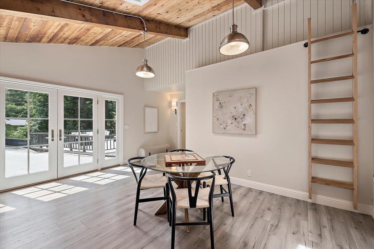 15251 Old Ranch Road Los Gatos, CA 95033 - Photo 14 of 38 a view of a dining room with furniture and wooden floor