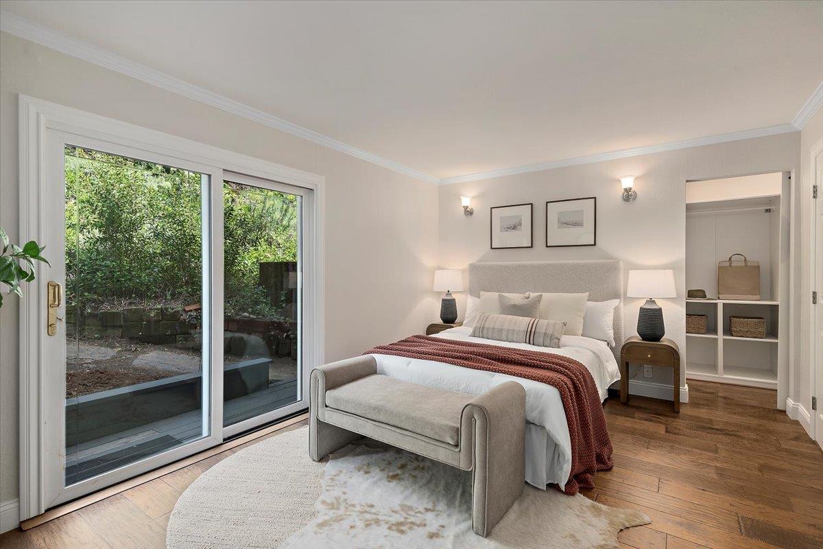 15251 Old Ranch Road Los Gatos, CA 95033 - Photo 16 of 38 a bedroom with a large bed and a window