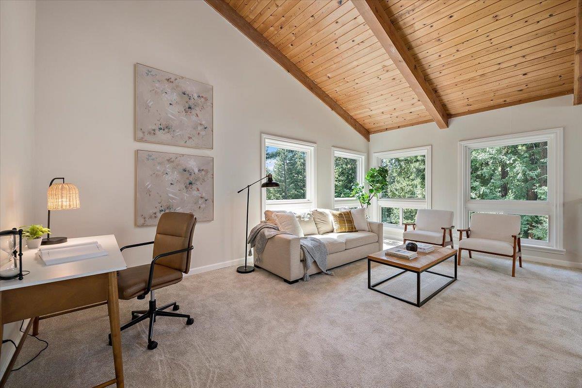 15251 Old Ranch Road Los Gatos, CA 95033 - Photo 22 of 38 a living room with furniture and a window