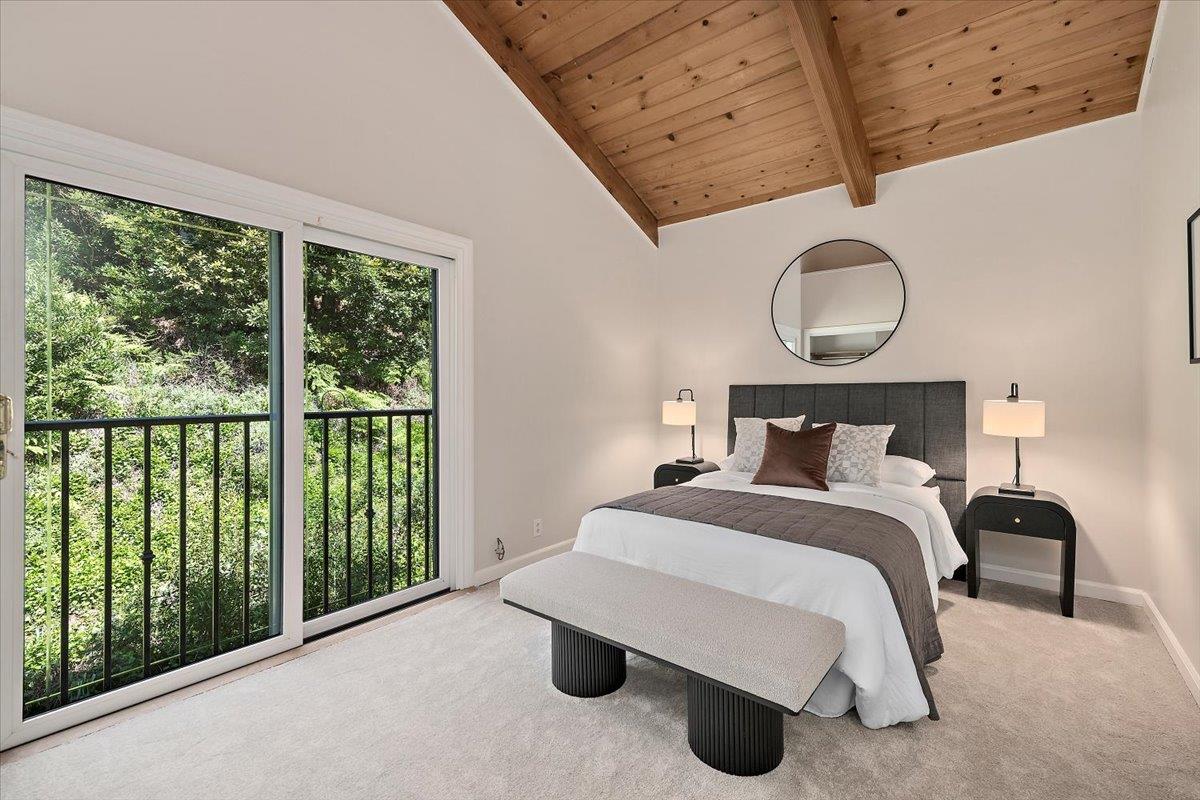 15251 Old Ranch Road Los Gatos, CA 95033 - Photo 24 of 38 a bedroom with a bed and window