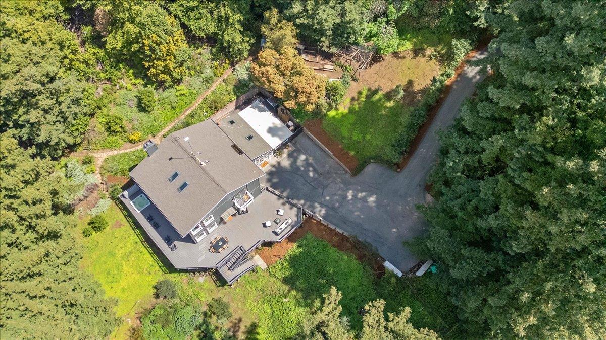 15251 Old Ranch Road Los Gatos, CA 95033 - Photo 34 of 38 an aerial view of a house with garden space and trees all around