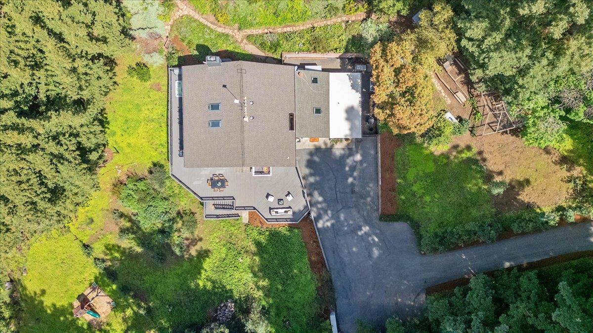 15251 Old Ranch Road Los Gatos, CA 95033 - Photo 35 of 38 a aerial view of a house with a yard and large trees