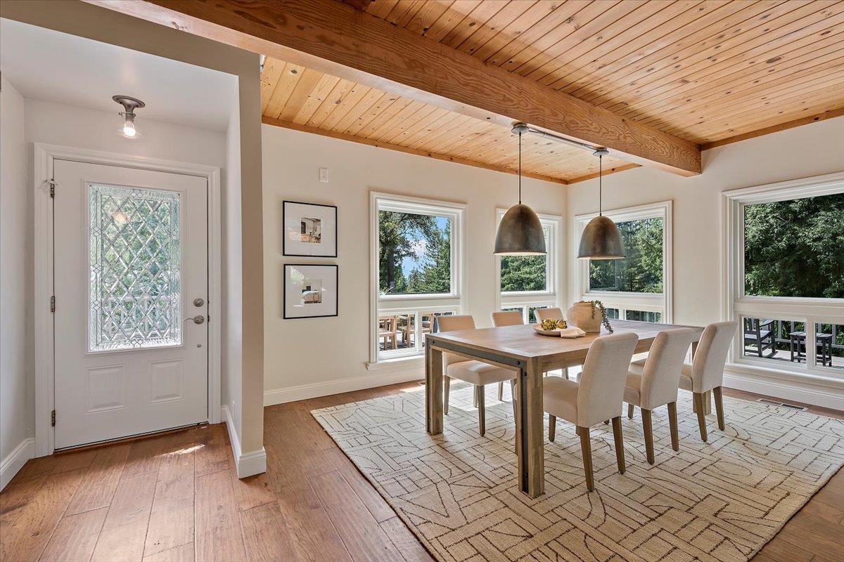 15251 Old Ranch Road Los Gatos, CA 95033 - Photo 5 of 38 a view of a dining room with furniture window and outside view