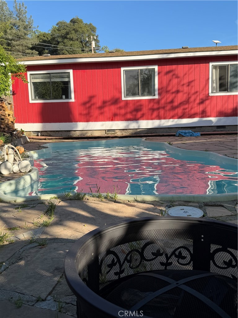 4047 Foothill Drive Lucerne, CA 95458 - Photo 15 of 75 a view of swimming pool with a yard and plants