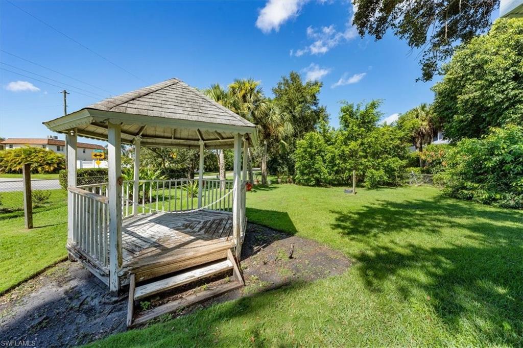 1984 Frederick Street Naples, FL 34112 - Photo 23 of 25 a garden view with a seating space